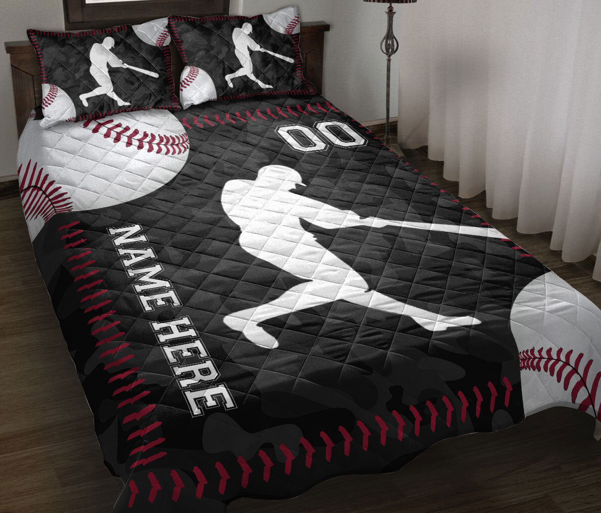 Baseball quilt blanket styled on a bed with batter silhouettes, baseballs, and black and red sports artwork