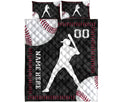 Baseball quilt bedding set displayed flat with batter artwork, baseball graphics, red stitching, and black background