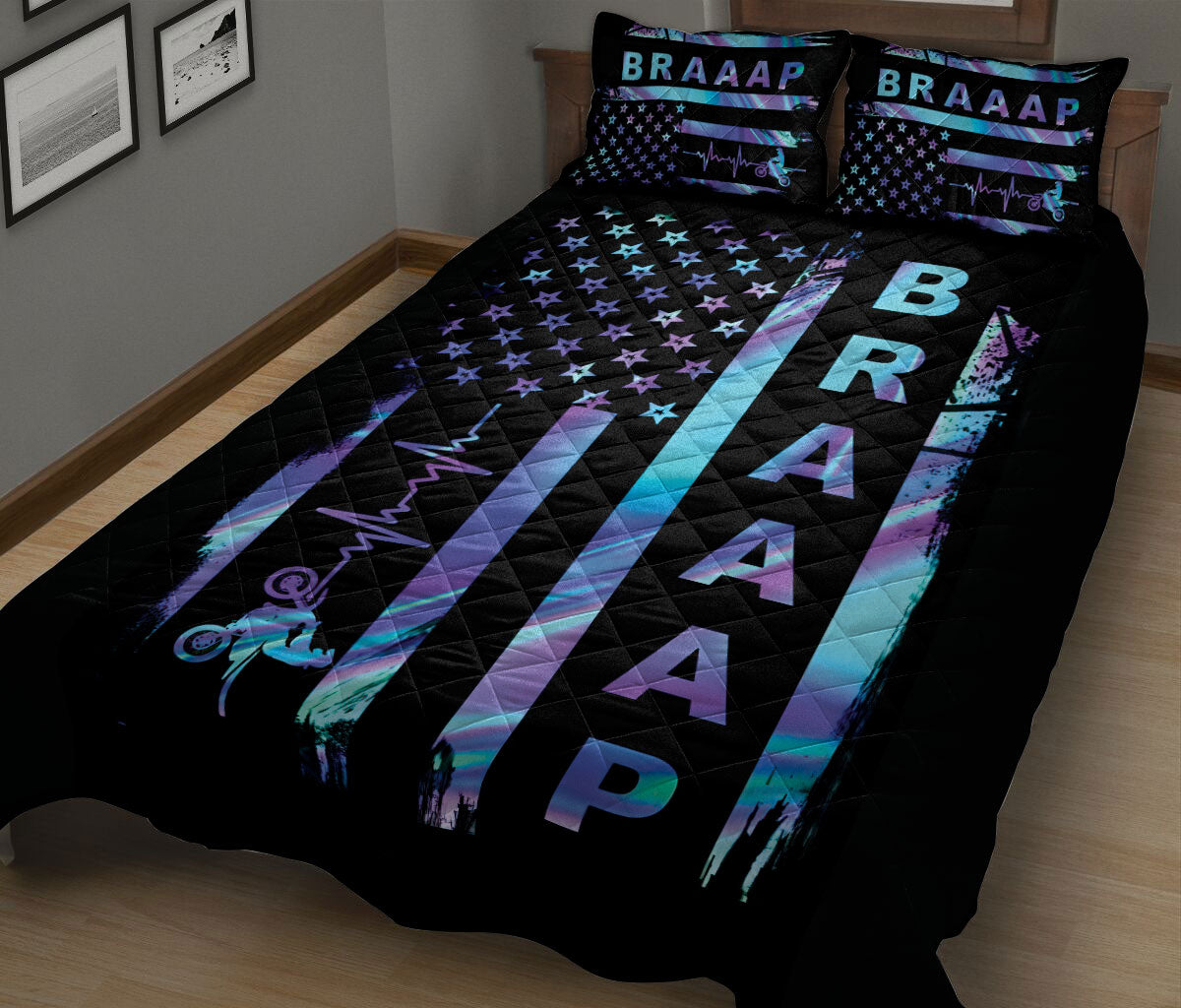Black motocross quilt blanket on a bed featuring neon motorcycle silhouettes, stars, stripes, and racing artwork