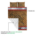 Firefighter quilt blanket shown folded to reveal the printed front design and white quilted backing