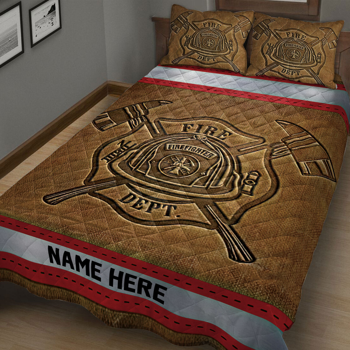 Close bedroom view of a firefighter quilt blanket featuring helmet, crossed axes, and firehouse emblem artwork
