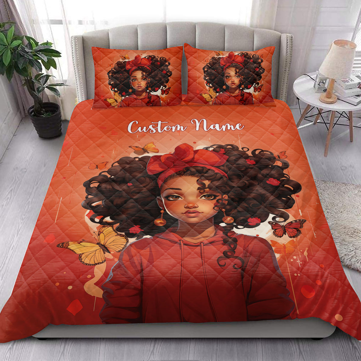 Red quilt blanket featuring a Black girl portrait with curly hair, butterflies, and coordinating bed pillows