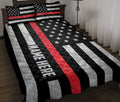 Firefighter quilt blanket displayed on a bed with patriotic thin red line flag artwork