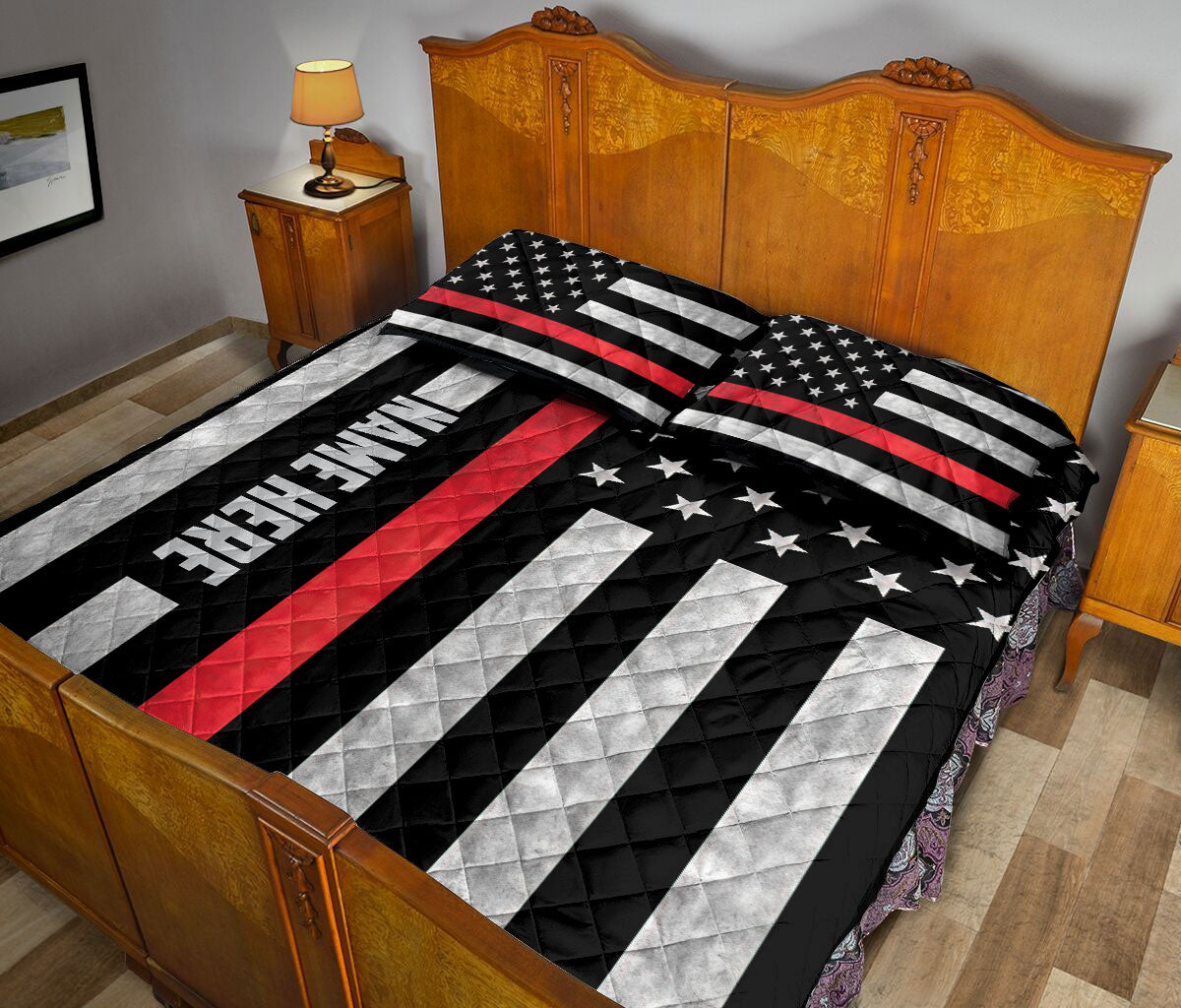 Firefighter quilt blanket styled in a bedroom with patriotic red, black and white artwork