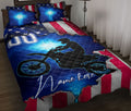Patriotic motocross quilt blanket featuring a dirt bike rider silhouette in a bedroom setting