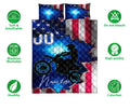 Motocross quilt bedding set with dirt bike artwork, blue lighting, stars, and red white blue design
