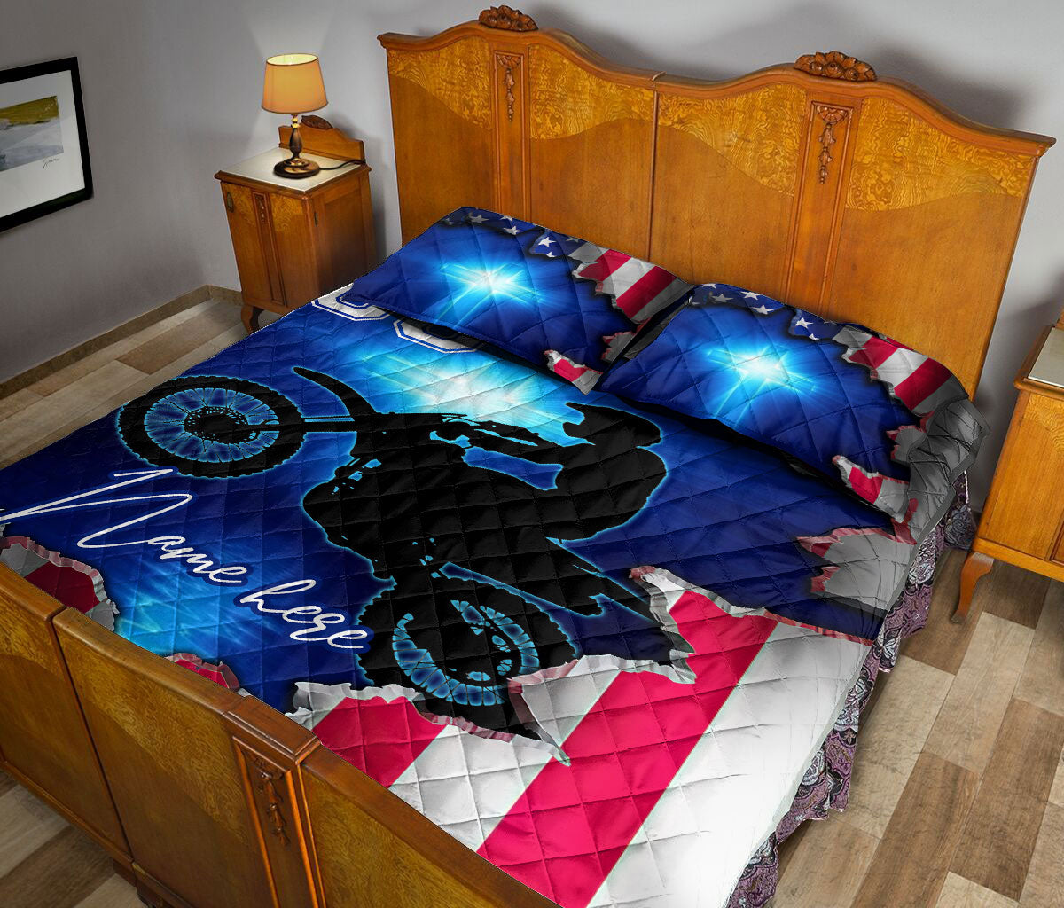 Patriotic dirt bike quilt blanket displayed across a traditional bedroom bed