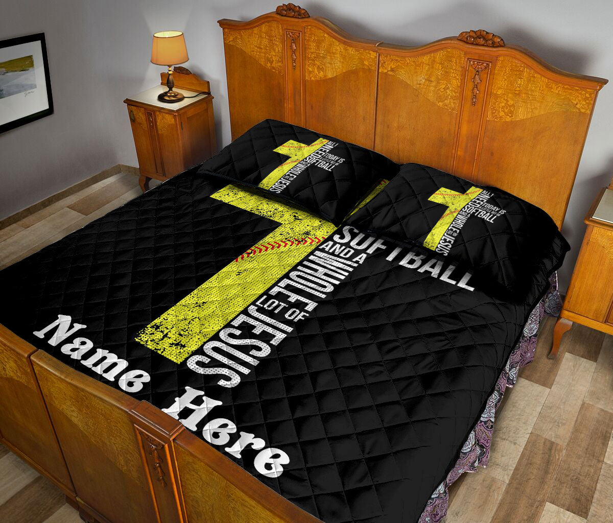 Softball quilt blanket styled across a bedroom bed with bold yellow sports artwork