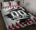 Baseball quilt blanket bedding set styled on a bedroom with red seams and bold black athletic artwork