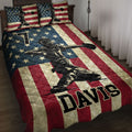 Patriotic baseball quilt blanket displayed on a bed with stars, stripes, and ballplayer artwork