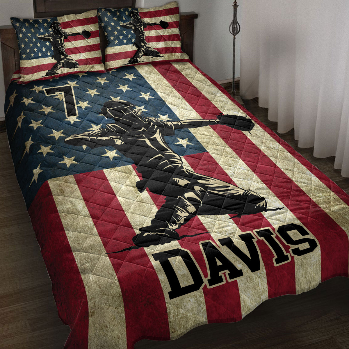 Patriotic baseball quilt blanket displayed on a bed with stars, stripes, and ballplayer artwork
