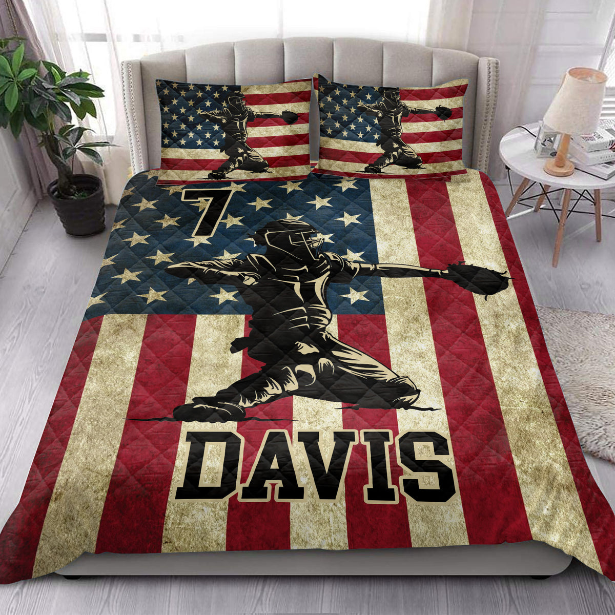 Patriotic baseball quilt blanket styled in a bright bedroom with matching sports artwork