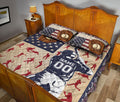 Baseball quilt blanket styled on a bedroom bed with vintage glove, ball, and player artwork
