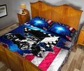 Dirt track racing quilt blanket styled in a bedroom with bold sprint car artwork and checkered flag details