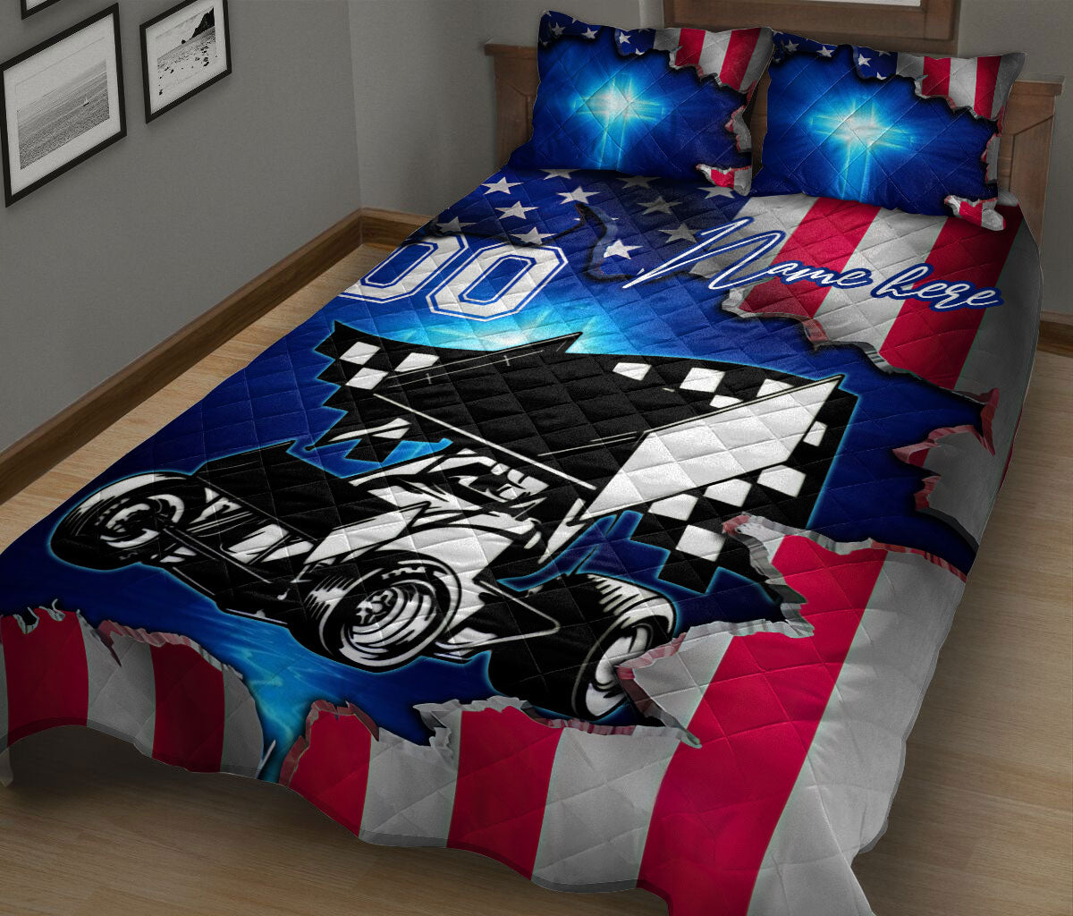 Racing quilt blanket on a bed with a black and white sprint car, blue highlights, checkered accents, and patriotic colors