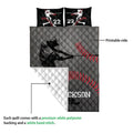 Baseball quilt detail showing the printed batting silhouette, red baseball stitching, diamond quilting, and white backing
