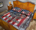 Firefighter quilt blanket styled across a bedroom with fire department emblem artwork