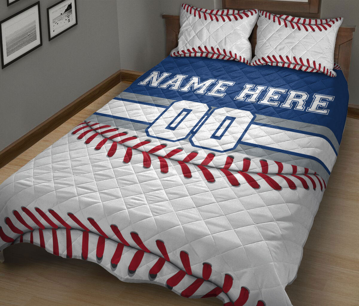 Baseball quilt blanket on a bed featuring bold blue, white, and red baseball-inspired artwork