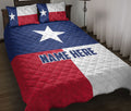 Texas flag quilt blanket displayed on a bed with bold Lone Star colors and matching flag-patterned pillows