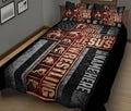 Wrestling quilt blanket displayed in a bedroom with bold athletic silhouettes and dark distressed graphics