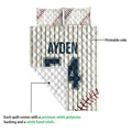 Baseball quilt blanket showing the printed front and white quilted reverse with pinstripe sports artwork