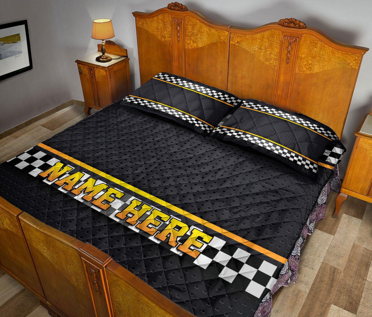 Racing quilt blanket styled in a bedroom with black checkered flag bands and yellow trim