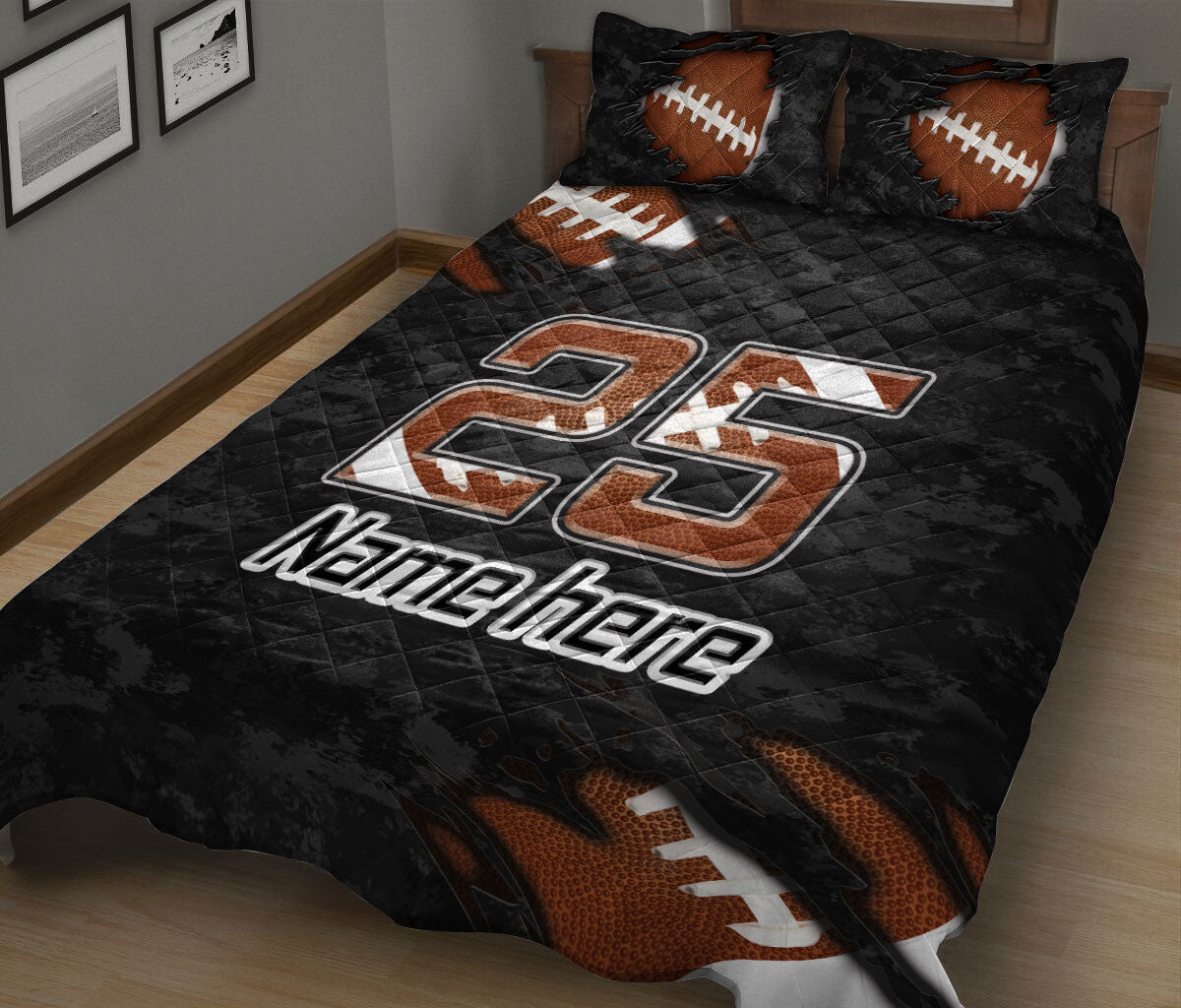 Black and orange football quilt blanket spread across a bed with large jersey-style sports artwork
