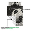 Soccer quilt showing the printed front and white quilted backing in a product detail view