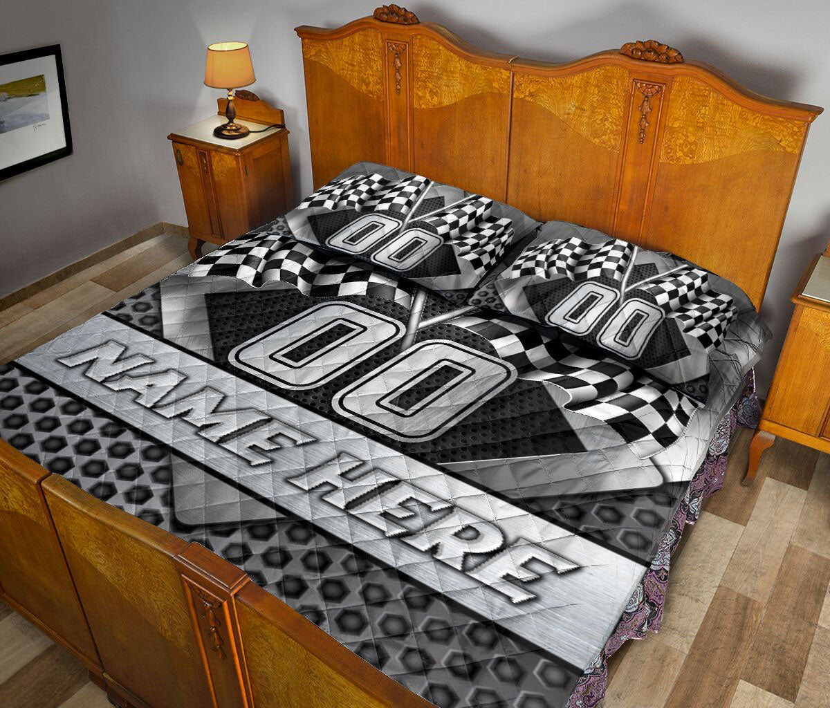 Racing quilt blanket styled across a bedroom with checkered flags and monochrome motorsport artwork