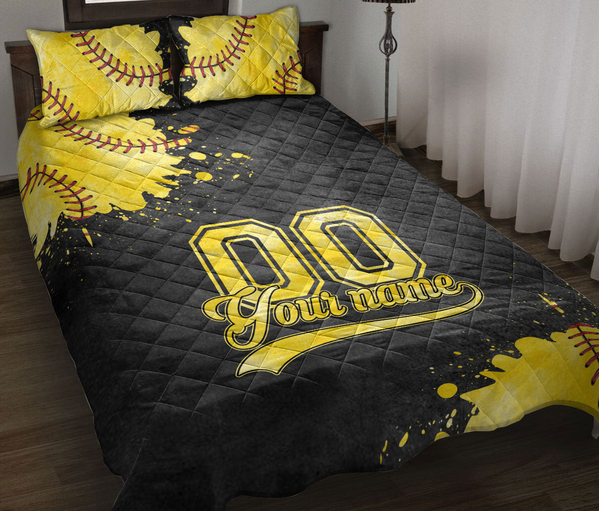 Black and gold softball quilt blanket styled on a bed with bold sports artwork