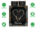 Fishing hook heart quilt bedding set shown with feature and care icons around the black patterned design