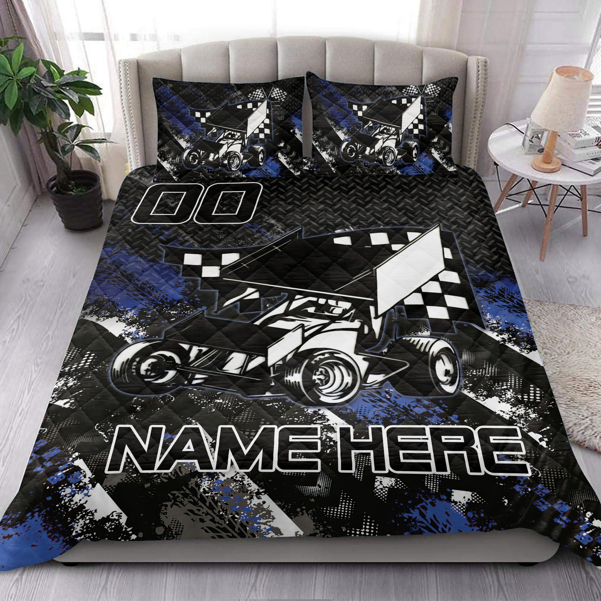 Dirt track racing quilt blanket styled in a bedroom with sprint car and checkered flag artwork
